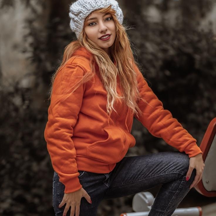 Ariya Shah, Lead Design Curator at BrownStudioElement, reviewing corporate floral arrangements